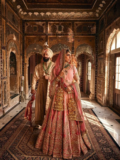 Couple in a mirrored haveli chamber