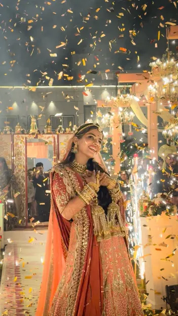 Bride amid a shower of petals